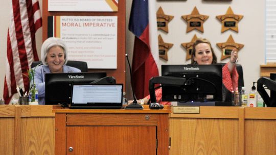 Hutto superintendent Celina Estrada Thomas (left), and school board president Billie Logiudice (right) welcome Kayla Gossett as she was announced as the new principal at Benjamin “Doc” Kerley Elementary School. Photo by Matt Hooks