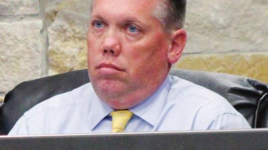 Hutto Mayor Mike Snyder listens attentively as updates on the water and wastewater plans are explained at last Thursday’s city council meeting June 16. Photo by Matt Hooks