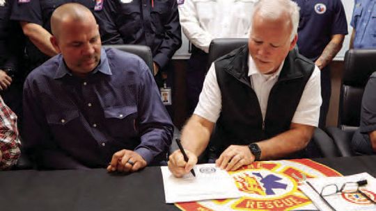 Hutto firefighters ink labor deal