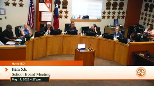 Members of the Hutto ISD school board canvas votes from the May 6 election where all three bond proposals passed. Screenshot from www.HippoNation.org.