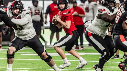 Texas Tech quarterback Will Hammond looks downfield during the program's spring game Saturday, April 20.