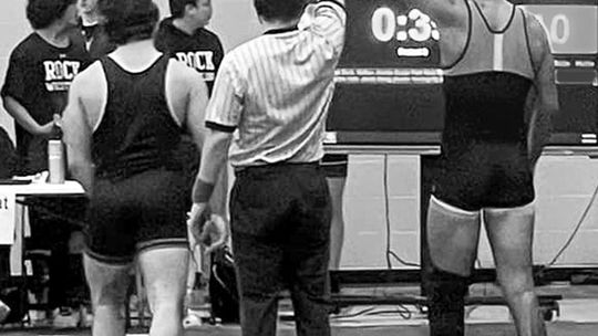 Hutto wrestling competes at district meet