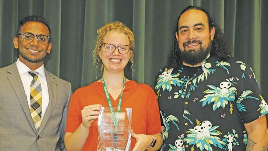 Taylor Middle School’s Teacher of the Year, Madison Smith (center), is congratulated on her award by Taylor ISD Superintendent, Dr. Devin Padavil (left), and Principal Steven Vigil. Photo by Tim Crow