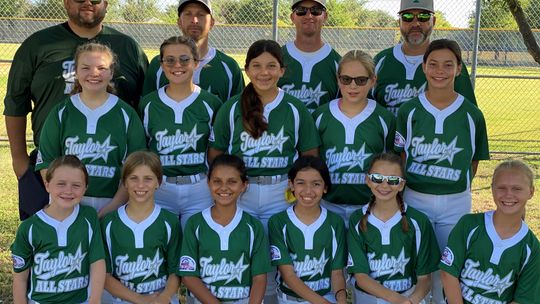 The Taylor 12 and under girls softball are left to right Lani Birkhead, Brynley Finn, Madi Gonzales, Alegra Rivera, Gracie Grimm, Hadley Gola. Standing left to right - Avery Dloughy, Lyla Morris, Whitney Drummond, AJ Masters and Jo Neiheiser. Coaches are from left to right, Brian Drummond,...