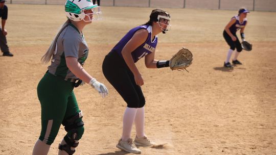 Kennan Nunamaker stands at third base ready to race home against Holland on day one of the Lady Ducks tournament. 