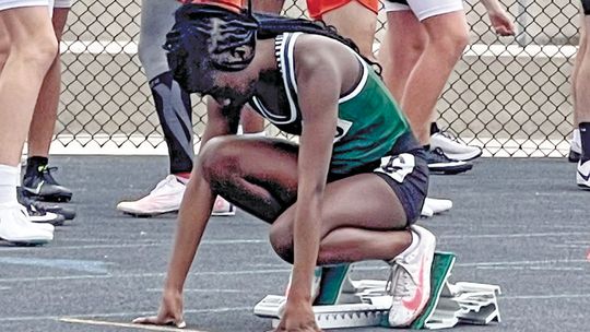 Zakaya Frederick getting set in the starting block before the starting pistol fires for the 400-meter. Courtesy Photo