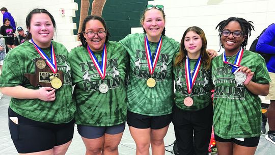 Medalists and award winners (from left) Analise Frias, Sophia Plonka, Krista Randig, Zoe Moore and Ri’Queleigh Holmes-Grant pose together for a picture after the meet. Courtesy Photo