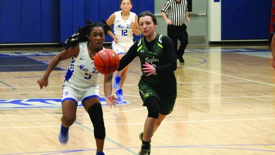 Lady Ducks hoops routs New Tech