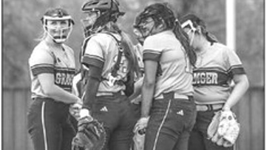 Payton Filla and the Lady Lions having a meeting on the mound to discuss strategy. Courtesy Photo