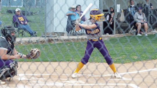 Lady Lions junior Montana Moore shifts her weight as she swings the bat looking to get on base against Holland.