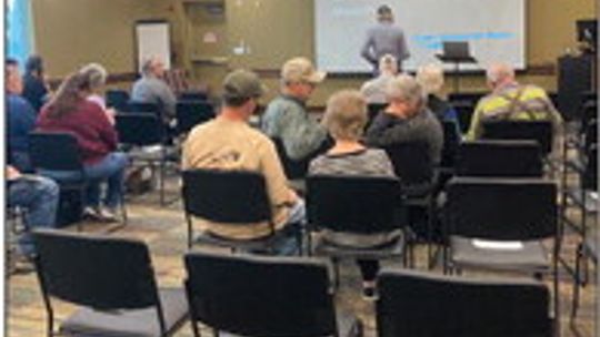 ETJ landowners wait for the start of a presentation by attorney Chris Johns, a founder of the Taylor Landowner Rights Coalition Feb. 27. Photo by Nicole Lessin.