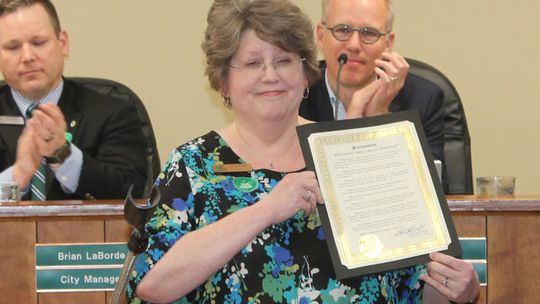 Karen Ellis accepts a proclamation for Census Day during the Taylor City Council meeting March 12, 2020. Ellis was a member of the Taylor Complete Count Committee created to help with the Census count. Photo by Fernando Castro