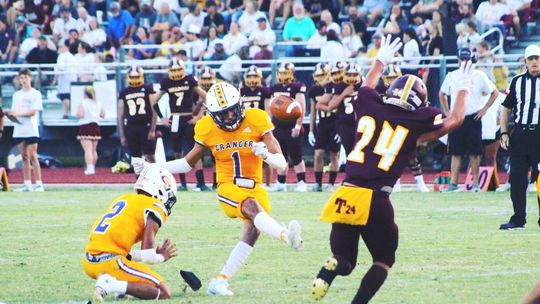 Granger High School varsity football junior kicker Jose Valverde puts the ball through the uprights on Sept. 1 during the Lions’ 38-7 victory over Thorndale High School. Photo by Elliot Bohuslav