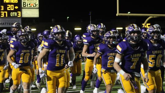 Lions taking the field to start the second half against Burton Friday night.  Photo by Evan Hale