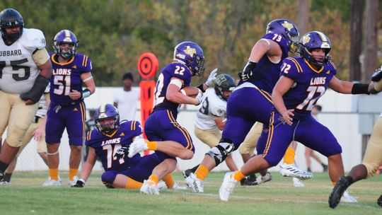 Granger High School sophomore running back Caleb Hobratsch breaks free for a big gain on Aug. 25 during the Lions’ 57-8 victory at home vs. Hubbard High School. Photo by Larry Pelchat