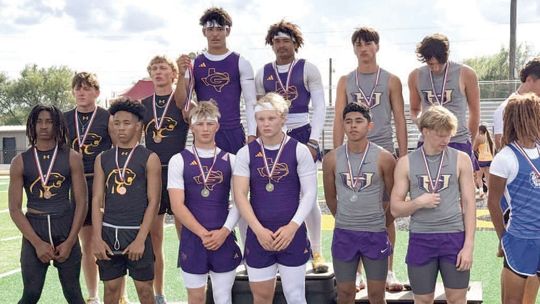 Lions track dominates, boys take district title