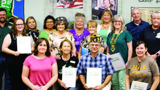 Representatives from local nonprofits received grants from the Livingston Fund. The fund distributed over $37,000 to 11 organizations. At the presentation are (front row, from left) Kaitlin Olle, Heahter Klotz, Scott Dean and Melanie Rathke. (Second row, from left) Desiree Grady, Jeannie H...