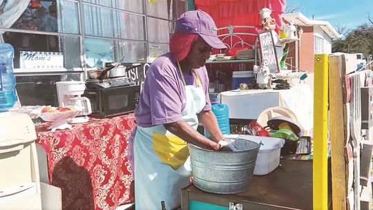 Local Queen feeds homeless at outdoor kitchen