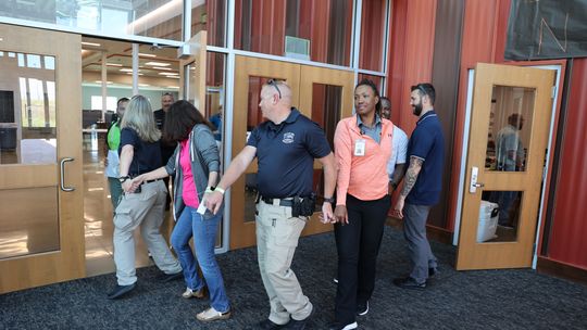 Hutto ISD officer David Lowthorp (center) participates in a training exercise at Hutto ISD June 8-9.