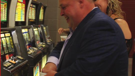 Constable Paul Leal gets lucky at slot machines at the Greater Taylor Chamber of Commerce’s Casino Night Gala in Taylor May 21.