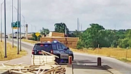The southbound entrance ramp onto S.H. 130 from U.S. 79 was closed Monday due to a lumber spill. Facebook / Hutto Police Department