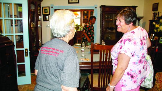 From left, Taylor Conservation and Heritage Society President Frances Sorrow talks to Secretary Maureen Gray. Photo by Nicole Lessin