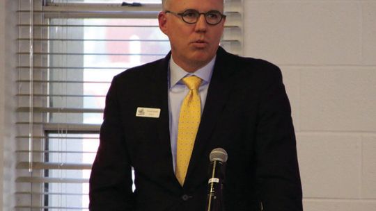 Mayor Brandt Rydell addresses a sold-out crowd at the Taylor Independent School District’s Event Center Feb. 27. Photo by Jason Hennington