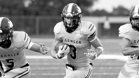 DJ McClelland running through a hole to gain yards against Thorndale. Photo by Larry Pelchat