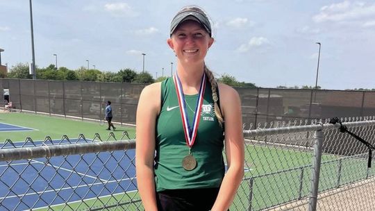 MICHNA SECURES DISTRICT TITLE