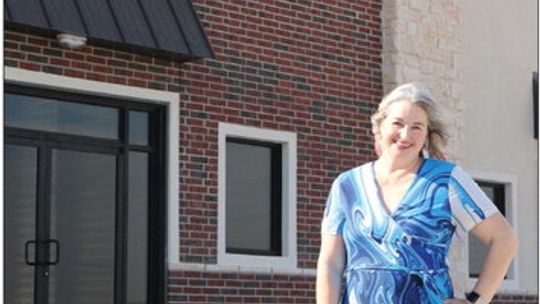 Elizabeth Bonura in front of the 1500 square foot future home of Bonura Studio at 3333 County Road 119. Bonura hopes the new arts commission creates more opportunities for artists to open studios and art spaces. Photo by Edie Zuvanich