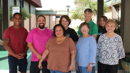 MUNCH Mentors are preparing for a new year of working with student during lunch at each campus. From left are Chris Van Buren, Adam Sanchez, Melissa Sanchez, Jennifer Patschke, Carol Bachmayer, John Matthews, Darlene Ramirez and Arlinda Hernandez. Photo by Tim Crow