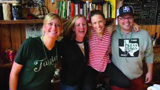 (From left) Megan Klein, Amy Everhart, Shannon Bagent and Ian Davis pose together behind the bar at the Black Sparrow Music Parlor in 2018. Courtesy photo