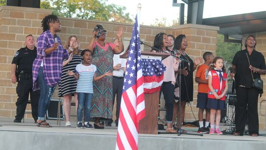 Church leaders, children and more sing during the National Day of Prayer in Taylor May 6, 2021. Photo by Fernando Castro