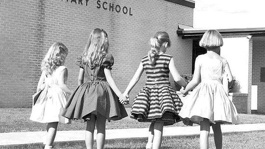 (From left) Pat Schirpik, Suzanne Klattenhoff, Susan Streit and Judy Voigt in the first day of school picture which appeared in Taylor Daily Press in 1959. Courtesy photos