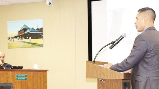 Armando Perez, customer operations representative with Oncor Electric Delivery, shares a presentation on his employer’s response to Winter Storm Mara with the Taylor City Council April 27.