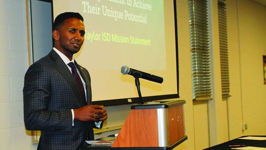 Superintendent Devin Padavil highlights Taylor Independent School District achievements and milestones at the March 20 luncheon sponsored by the Greater Taylor Chamber of Commerce. Photos by Nicole Lessin