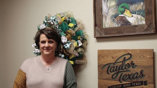 Jennifer Patschke, the new assistant superintendent of human resources and federal programs for Taylor Independent School District, poses in her office Jan. 24. Photo by Nicole Lessin