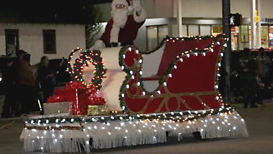 Santa Claus waves to the people who came out to watch the parade. Photo by Nicole Lessin