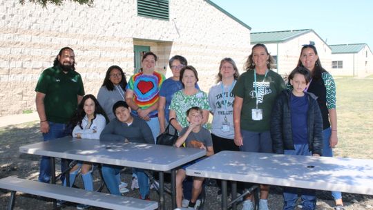 Cheryl Mazur and Barbara Sladek of the Taylor Garden Club present two picnic tables to Kindra Wimberley and her class at Taylor Middle School. Also present for the presentation are principal Steven Vigil and instructional assistants Theresa Randig and Andrea Razo. Students will enjoy the t...