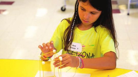 Ava Jalvan working on her structure. Courtesy photo / Samsung Austin Semiconductor