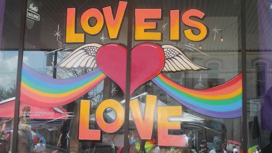 A window in downtown Taylor displays “Love is Love” during the Taylor Pride event June 26, 2021. Photo by Fernando Castro