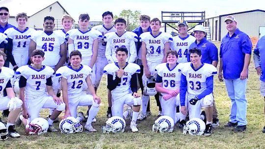 Rams pose together as a team after clinching their first ever playoff spot. Courtesy photos