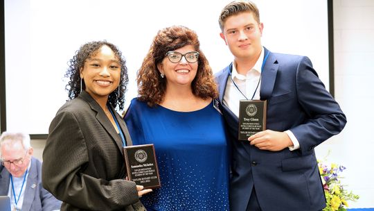 Taylor High School Extracurricular Student Award winners Samantha McIntire and Troy Glenn are pictured with Tia Rae Stone, Rotary Club of Taylor president, at a banquet May 2. The winners were selected by their teachers.Photo by Richard Stone
