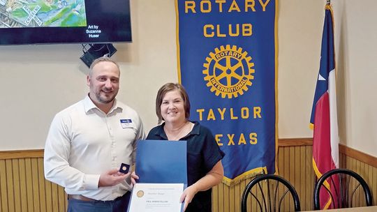 ROTARY AWARDS NEWEST FELLOW