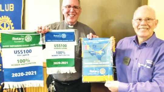 George Qualley (left) accepts the three recognitions for the Taylor Rotary Club from Jerry Chapman, past district govern. Courtesy photo