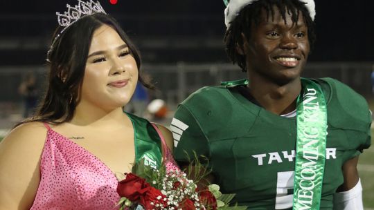 Annalise Frias and Jarvis Anderson are crowned the 2022 homecoming queen and king of Taylor Independent School District during halftime of the Taylor High School varsity football game against Jarell at the Duck Pond in Taylor Sept. 23 Photo by Jason Hennington