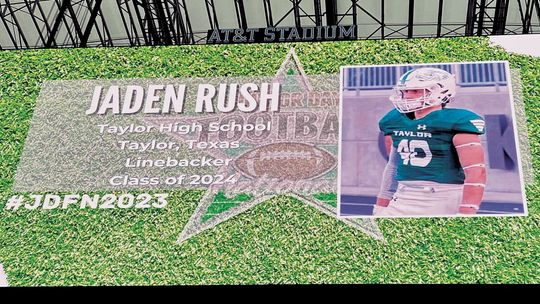 Taylor High School varsity football senior linebacker Jaden Rush has his picture displayed on the AT&amp;T scoreboard on Sunday, July 16 during the Junior Day Football National Showcase in Arlington. Photos courtesy of Joe Rush