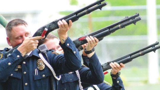 The Taylor Police Department Honor Guard offers a three-volley salute during the Memorial Day salute in Taylor May 28, 2017. File photo