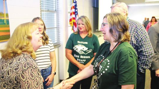 SAMSUNG GIFTS BOOKS TO TAYLOR ISD