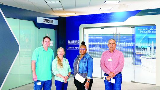 Marvin Croft and Amy Heffernan, two Taylor High School teachers, posed with two teachers from Austin ISD during last week’s externship program. Photo courtesy of Samsung Austin Semiconductor.